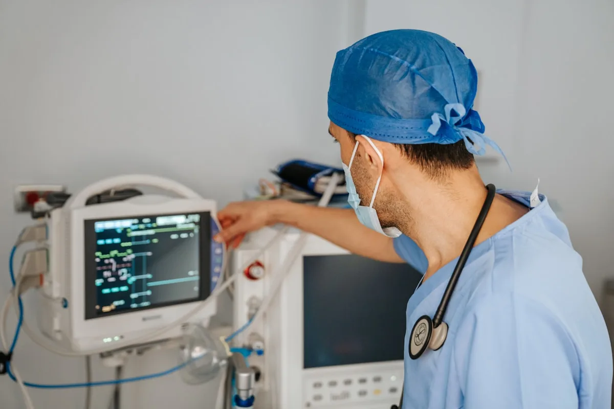Healthcare worker analysing patient data on a screen